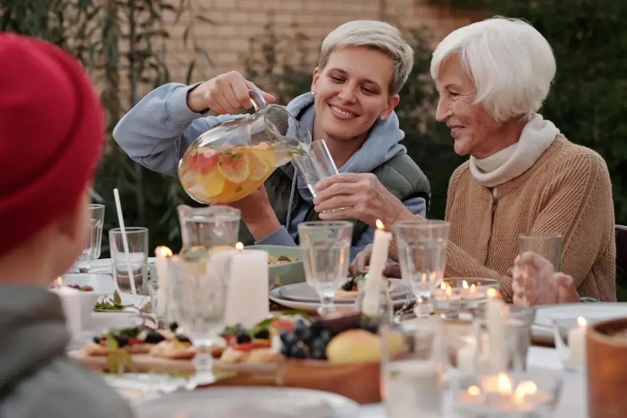 Family drinking clean water from a pitcher
